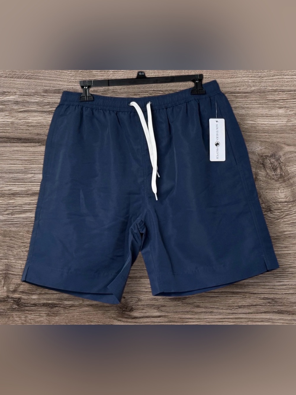 NWT Southern Proper performance swim trunks in a classic navy blue color SZ M